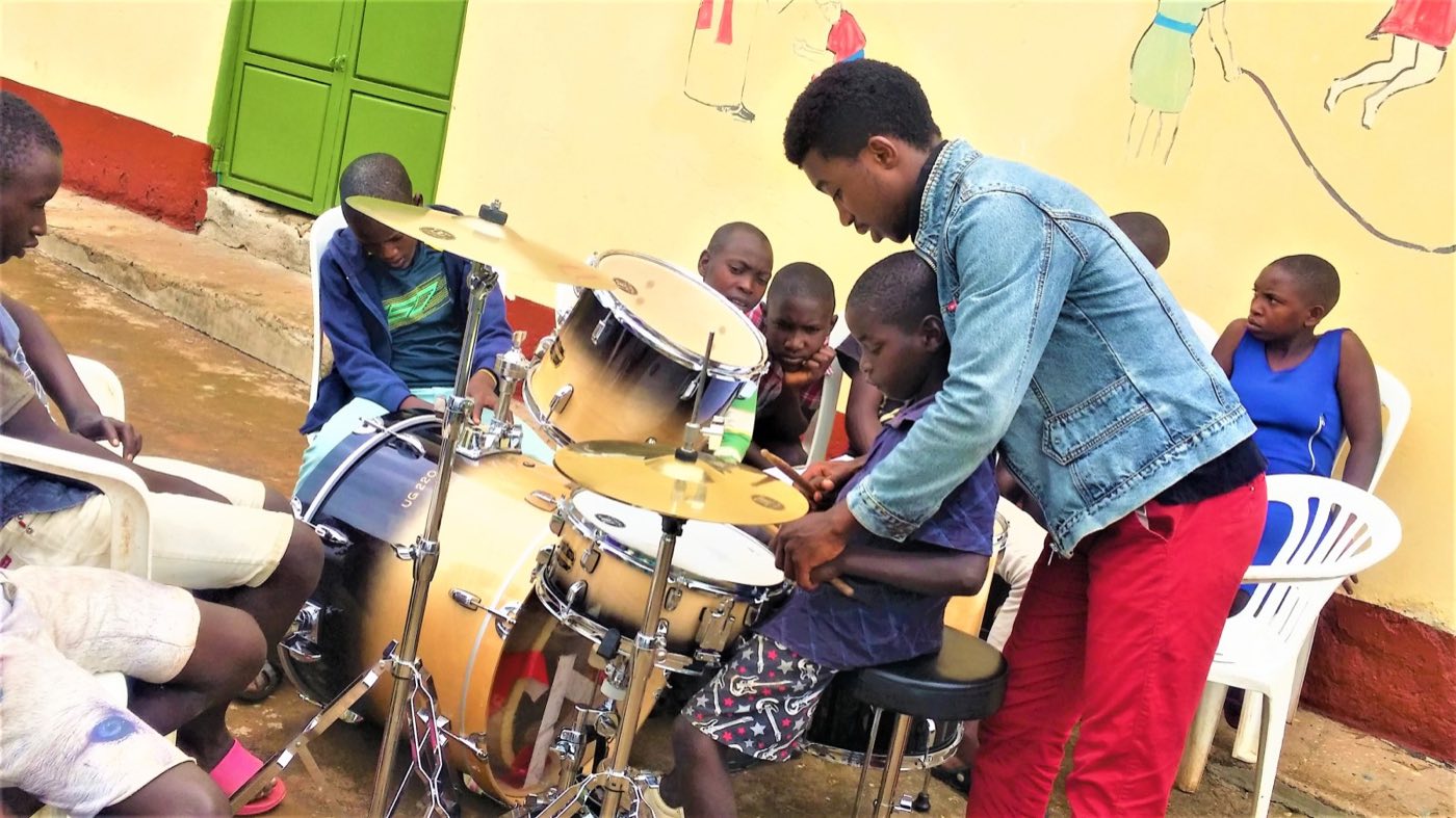 Franklin teaching a drum lesson