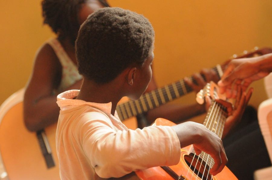 child playing guitar