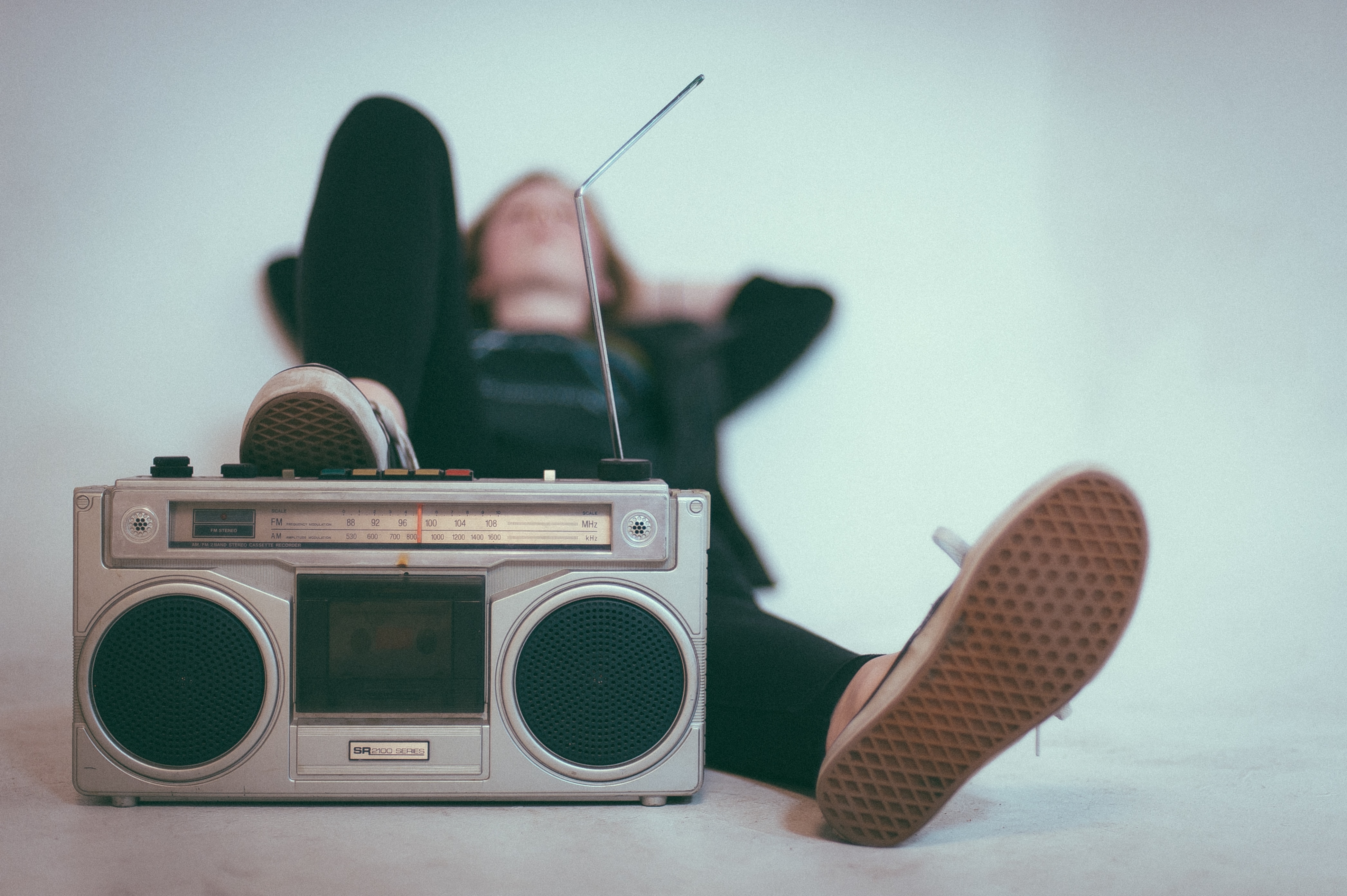 Women Listening to Music with speaker
