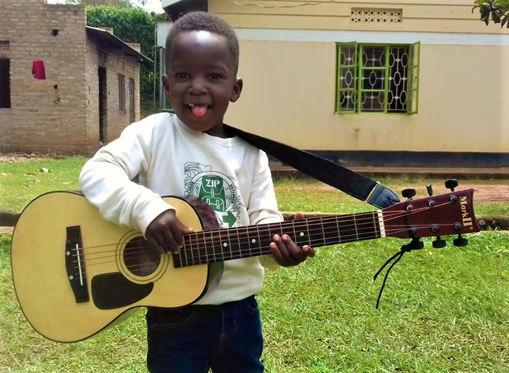 child playing guitar