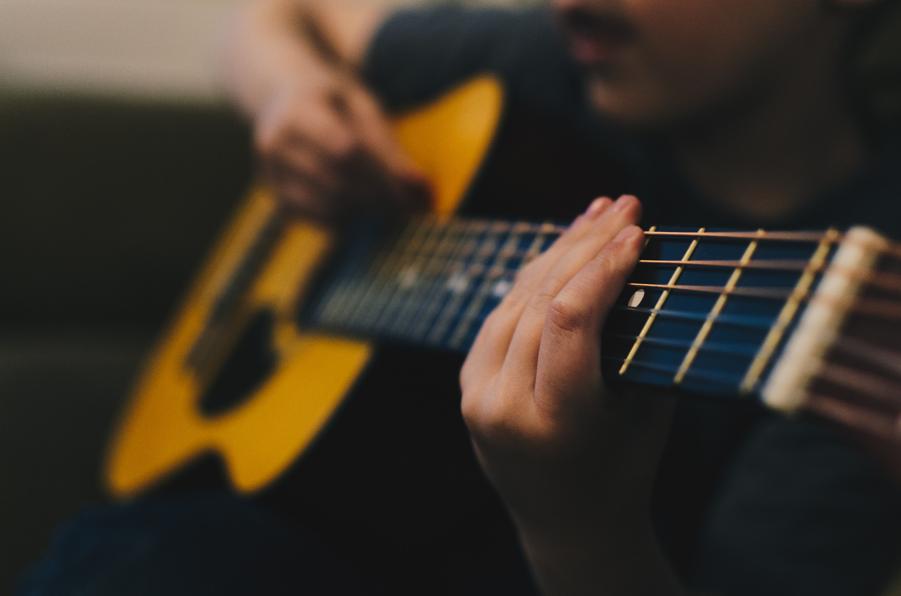person playing guitar